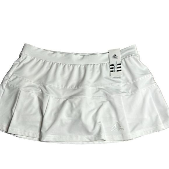 ADIDAS white skort with pleats on the bottom  half . Then two horizontal bands. - Picture 1 of 11